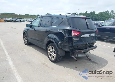 2014 Ford Escape Titanium z USA, uszkodzony, nr VIN 1FMCU9J92EUD19320